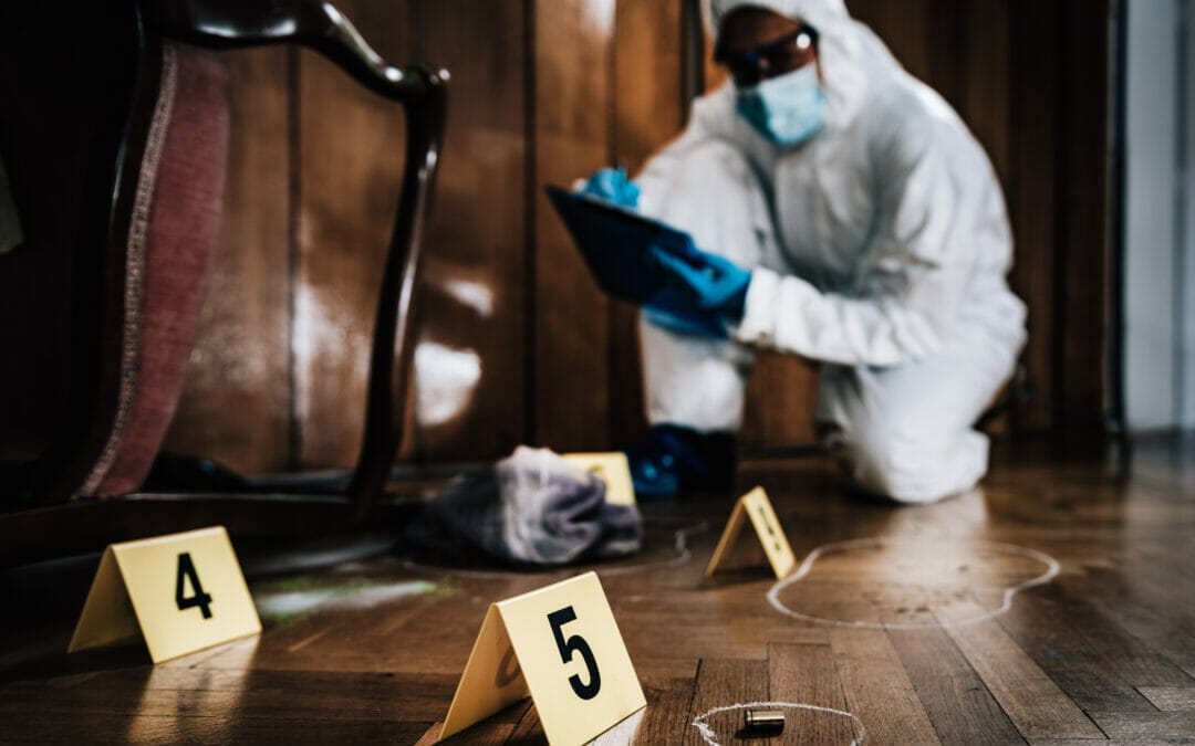 Crime scene detective examining evidence